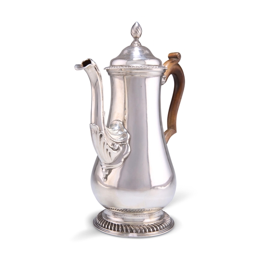 1126 - A GEORGE III SILVER COFFEE POT, Daniel Smith & Robert Sharp, London 1771, of baluster form, the hing... 