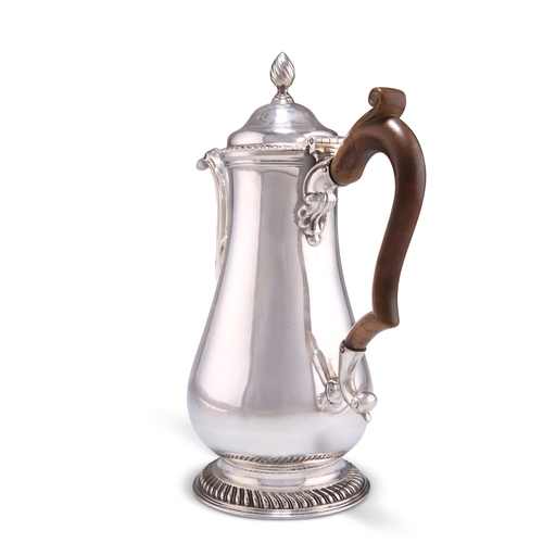 1126 - A GEORGE III SILVER COFFEE POT, Daniel Smith & Robert Sharp, London 1771, of baluster form, the hing... 