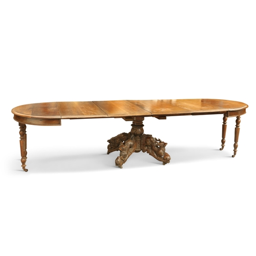 698 - A CONTINENTAL 19TH CENTURY OAK EXTENDING DINING TABLE, the ends of circular form, raised on a centra... 