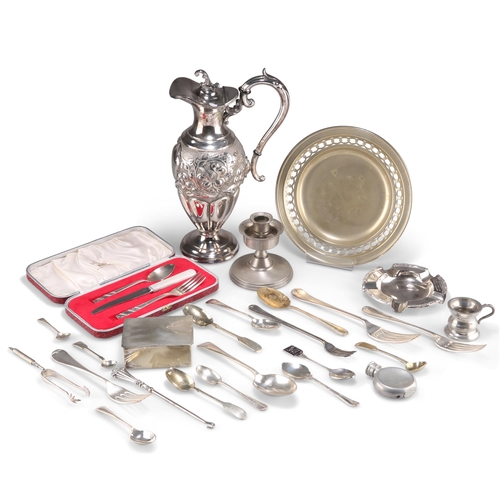 1003 - A GROUP OF SILVER-PLATE, including a claret jug. (Qty) Claret jug 28cm high