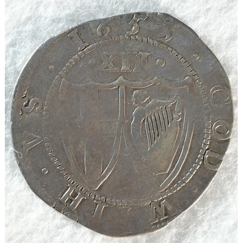 175 - Commonwealth, 1653 shilling, 5.77 grams, 30.9mm, 9h, mintmark sun. Obv: Shield with St. George's cro... 