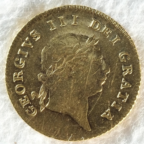 192 - George III (1760 - 1820) 1809 half-guinea. Obv: Second laureate head right. Rev: Shield in garter, d... 