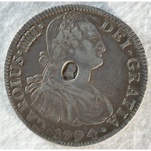 214 - George III (1760-1820), Mexico City dollar. Oval countermark upon Spanish eight reales of King Charl... 