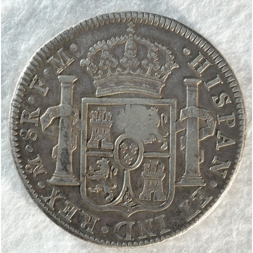 214 - George III (1760-1820), Mexico City dollar. Oval countermark upon Spanish eight reales of King Charl... 