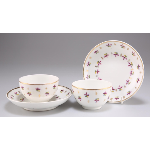 104 - A PAIR OF NYON TEA BOWLS AND SAUCERS, CIRCA 1790, each decorated with scattered flowers, each with u... 