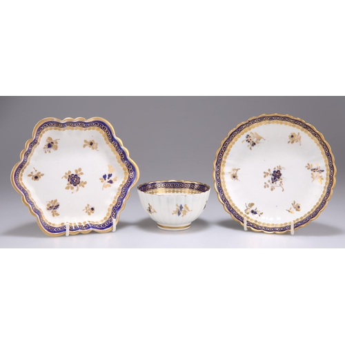 117 - A CAUGHLEY 'DRESDEN FLOWERS' TEA BOWL, SAUCER AND HEXAGONAL STAND, CIRCA 1780-1785, of fluted form, ... 