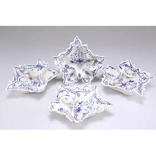 127 - A SET OF FOUR GERMAN BLUE AND WHITE PORCELAIN LEAF SHAPED PICKLE DISHES, with stem loop handles. (4)... 