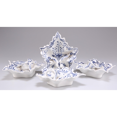 127 - A SET OF FOUR GERMAN BLUE AND WHITE PORCELAIN LEAF SHAPED PICKLE DISHES, with stem loop handles. (4)... 