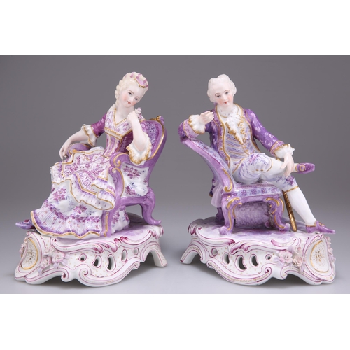 134 - A PAIR OF DRESDEN PORCELAIN FIGURES, modelled as a seated 18th Century lady and gentleman, on pierce... 