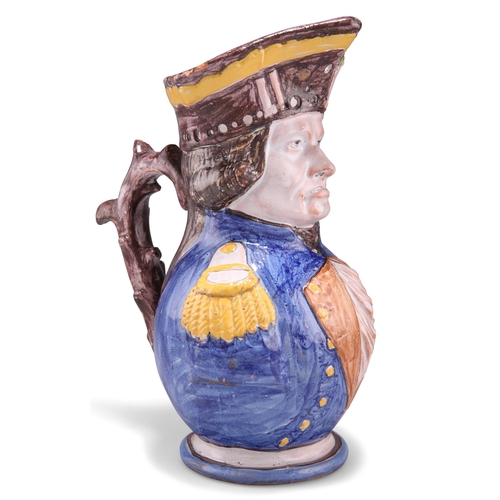 140 - A FRENCH FAÏENCE PUZZLE JUG, 19TH CENTURY, modelled and painted as a stern naval officer, his mangan... 