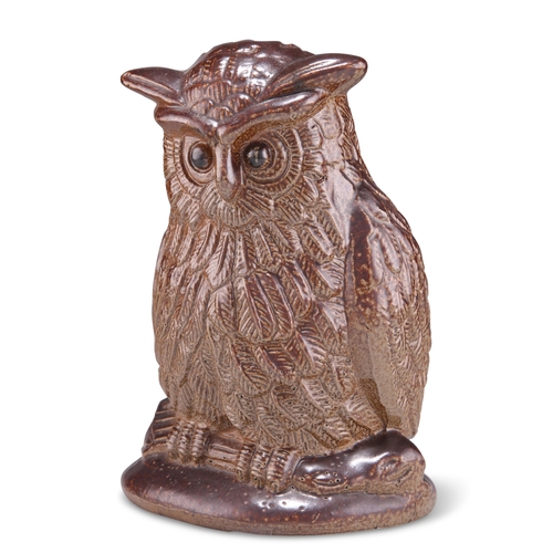 157 - A VICTORIAN SALT-GLAZED STONEWARE MODEL OF AN OWL, perching and with detailed feathers. 20.5cm high