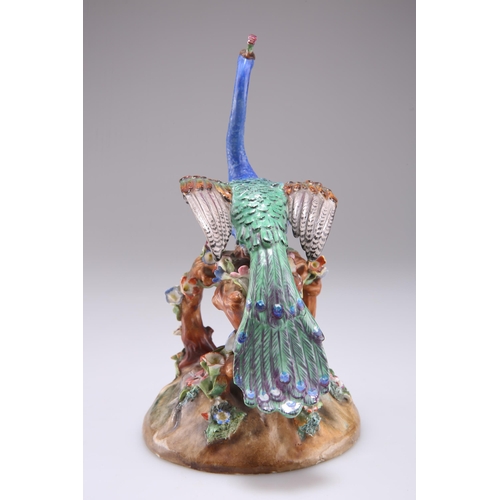 162 - A CONTINENTAL PORCELAIN MODEL OF A PEACOCK, the brightly coloured bird perched on a floral encrusted... 