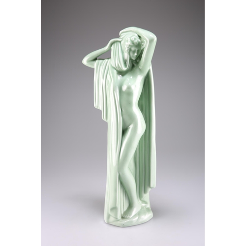 186 - AN ART DECO CELADON GLAZED FIGURE, modelled as a scantily clad maiden. 48cm high