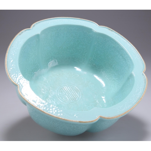 233 - A CHINESE TURQUOISE GLAZED LOBED BOWL, thickly potted, moulded inside and out in low relief with lot... 