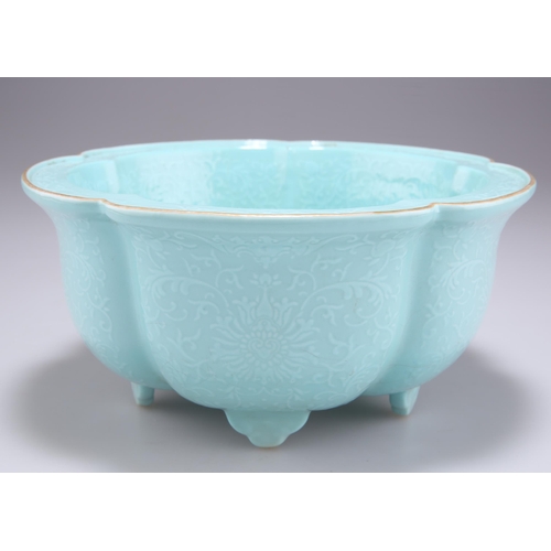 233 - A CHINESE TURQUOISE GLAZED LOBED BOWL, thickly potted, moulded inside and out in low relief with lot... 