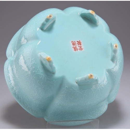 233 - A CHINESE TURQUOISE GLAZED LOBED BOWL, thickly potted, moulded inside and out in low relief with lot... 