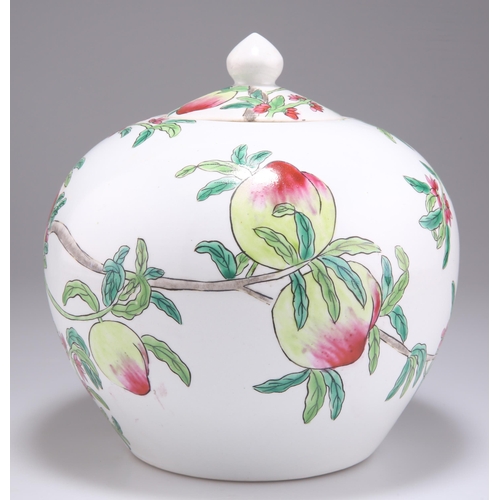 241 - A CHINESE FAMILLE ROSE VASE AND COVER, the squat body painted with peaches, bears a red mark to the ... 