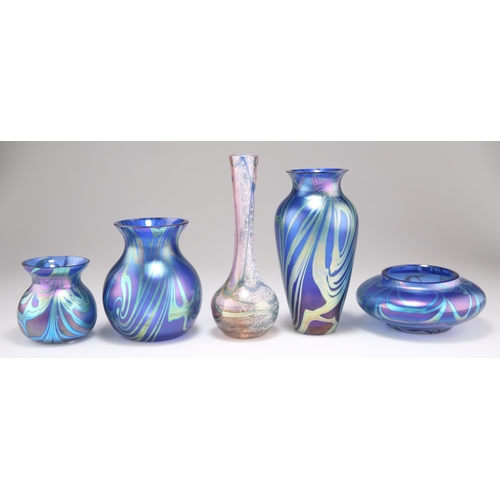 25 - FIVE OKRA STUDIO GLASS VASES, comprising four iridescent blue examples and a Coral bottle vase, with... 