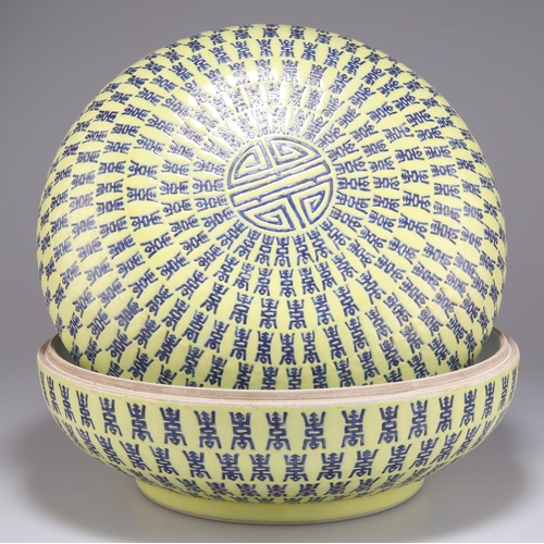 251 - A CHINESE LARGE YELLOW-GROUND BOX AND COVER, circular, painted with continuous bands of motifs, bear... 