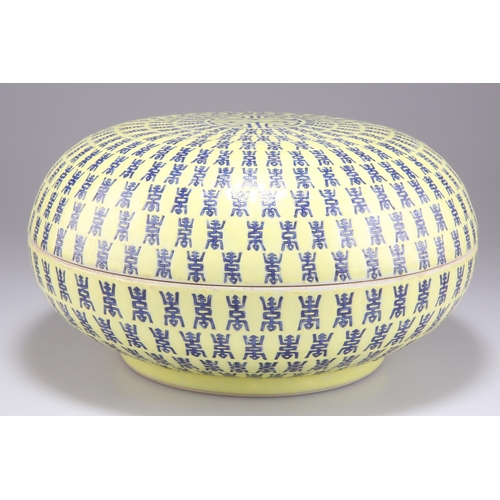 251 - A CHINESE LARGE YELLOW-GROUND BOX AND COVER, circular, painted with continuous bands of motifs, bear... 