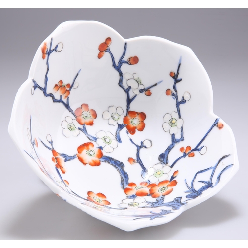 253 - A CHINESE LOTUS BOWL, enamel painted to the interior and exterior with prunus blossom, bears an iron... 