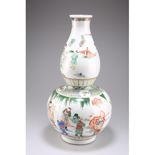 261 - A VERY LARGE CHINESE FAMILLE VERTE DOUBLE-GOURD VASE, painted in the characteristic palette with con... 