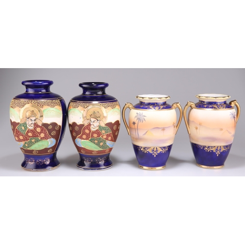 275 - A PAIR OF JAPANESE NORITAKE CHINA TWO HANDLED VASES, baluster form, enamelled and gilded with desert... 