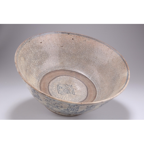 277 - A KOREAN CRACKLE GLAZED BOWL, the exterior decorated with bands of blue glazed characters, on a grey... 