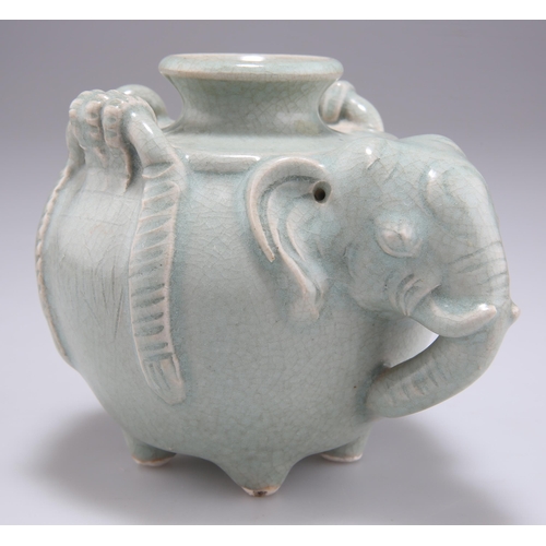 278 - A THAI SAWANKHALOK CELADON ELEPHANT VESSEL, in the form of a saddled elephant. 11cm high