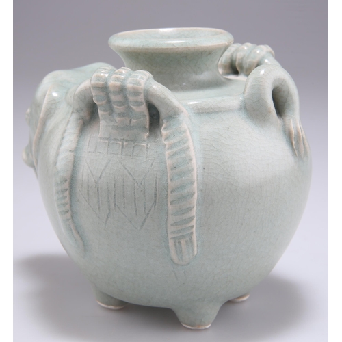 278 - A THAI SAWANKHALOK CELADON ELEPHANT VESSEL, in the form of a saddled elephant. 11cm high