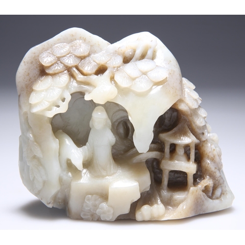 290 - A CHINESE JADE BOULDER CARVING, PROBABLY QING DYNASTY, carved with a figure, pagoda and prunus bloss... 