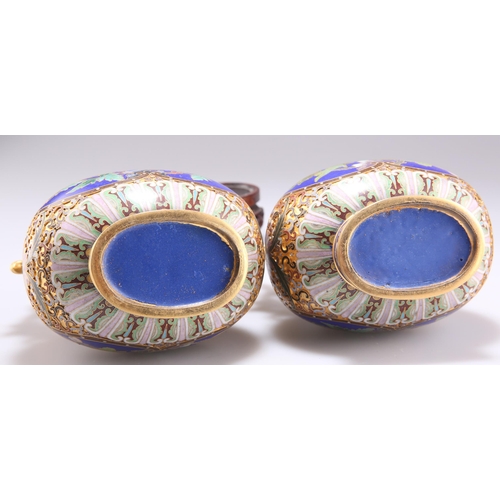 297 - A PAIR OF DOUBLE GOURD CLOISONNÉ VASES, with phoenix handles and 'stem' covers, decorated with reser... 