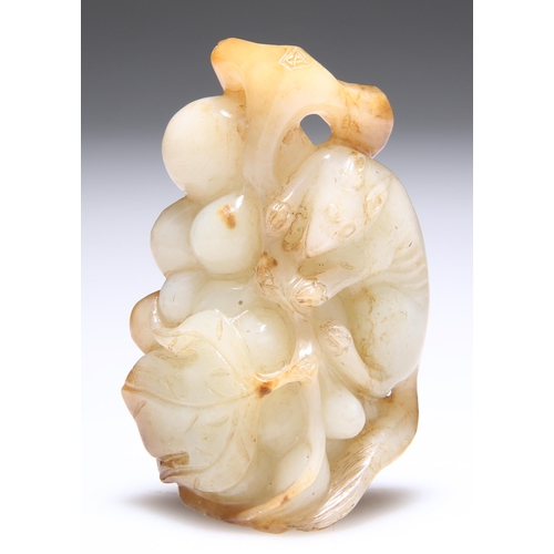 320 - A JADE CARVING OF A SQUIRREL AND GRAPES. 7cm by 4.5cm