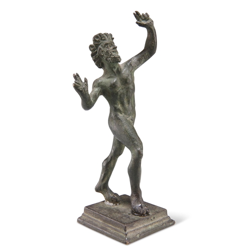 329 - A GRAND TOUR BRONZE FIGURE, THE DANCING FAUN OF POMPEII, modelled with arms outstretched, to a stepp... 