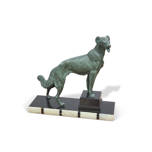 333 - AN ART DECO STYLE PATINATED SPELTER MODEL OF A DOG, on a marble base. 37cm high