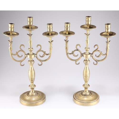 358 - A LARGE PAIR OF VICTORIAN HEAVY BRASS THREE-LIGHT CANDELABRA, with scroll-form branches. (2) 42cm hi... 