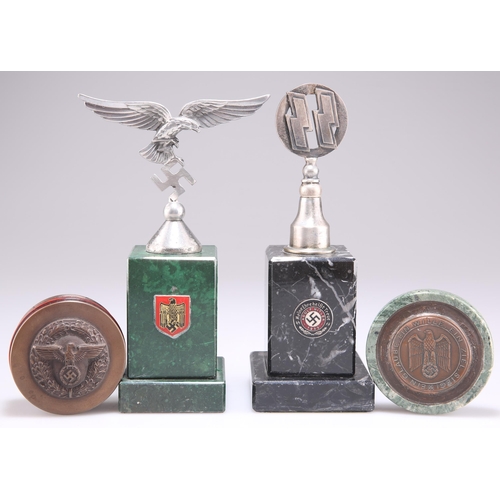 414 - A WWII GERMAN WAFFEN SS DESK PAPERWEIGHT, the black marble plinth surmounted by a chromed Schutzstaf... 