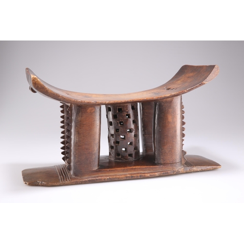 429 - A WEST AFRICAN ASHANTI STOOL, LATE 19TH/EARLY 20TH CENTURY, Ghanaian, of typical form, carved from a... 