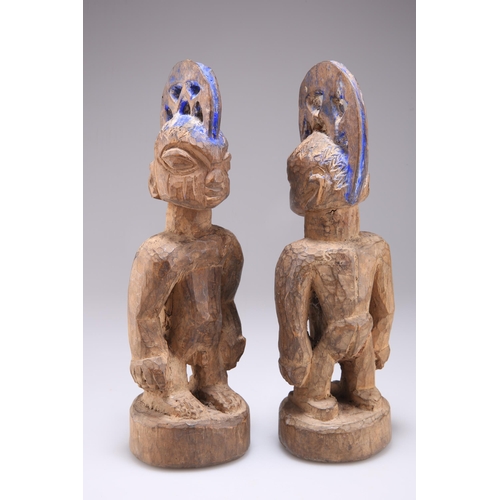 430 - A PAIR OF NIGERIAN YORUBA 'ERE IBEJI' TWIN MALE CARVED WOODEN FIGURES, EARLY 20TH CENTURY, the West ... 