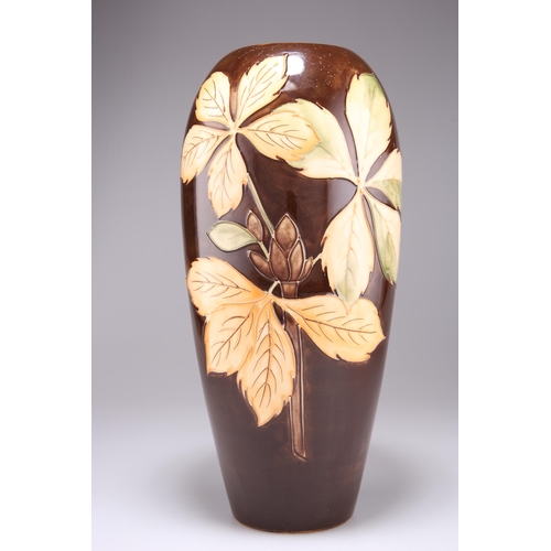 44 - A WALTER MOORCROFT LARGE POTTERY VASE, baluster form, 'Chestnut Leaves' pattern, tubelined and hand-... 