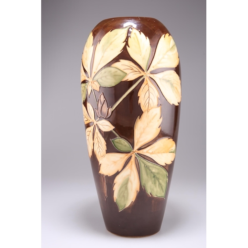 44 - A WALTER MOORCROFT LARGE POTTERY VASE, baluster form, 'Chestnut Leaves' pattern, tubelined and hand-... 