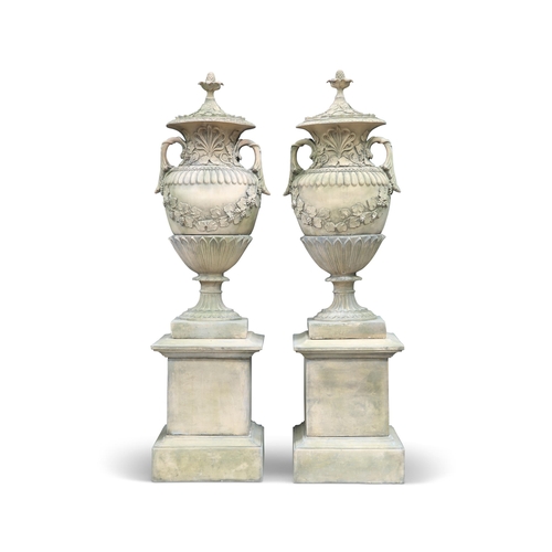 441 - A PAIR OF EXCEPTIONALLY LARGE RECONSTITUTED STONE GARDEN URNS, with detachable covers, the bulbous u... 