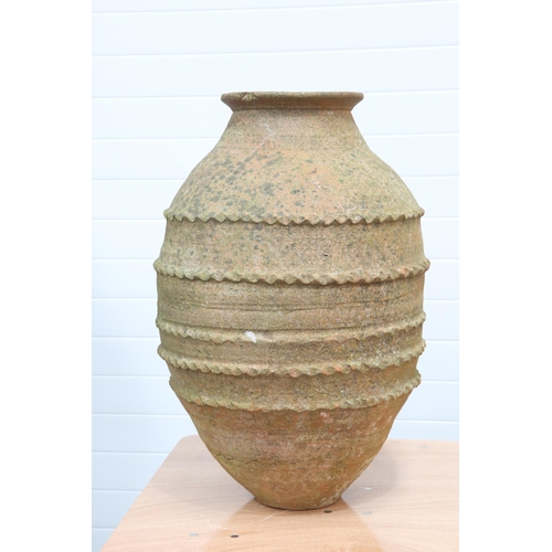 453 - A LARGE TERRACOTTA OLIVE POT, the freestanding ovoid jar with weathered patina, decorated with five ... 