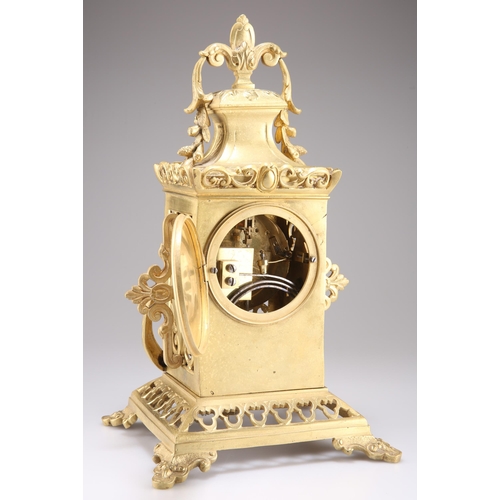 485 - A FRENCH GILT-BRASS MANTEL CLOCK, the pierced case cast with drapery and trefoils, the dial with Rom... 