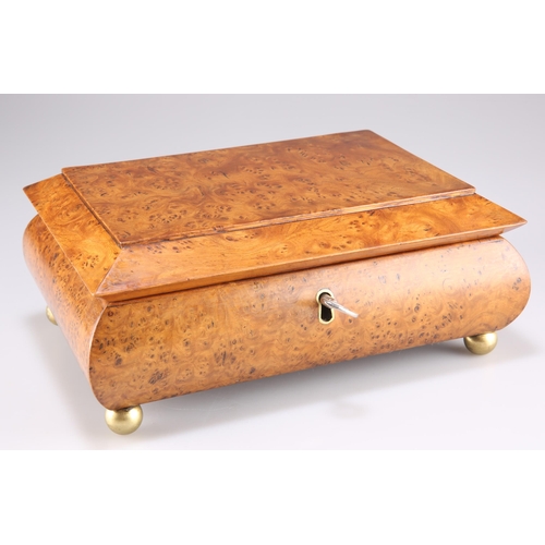 508 - A 19TH CENTURY BURR YEW JEWELLERY BOX, of bombe form, the hinged rectangular cover opening to reveal... 