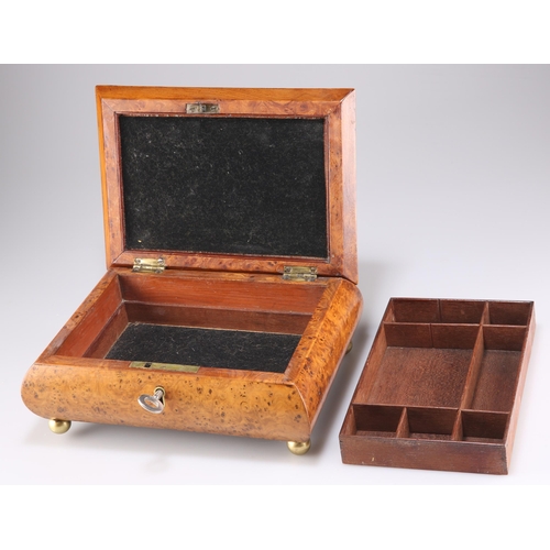 508 - A 19TH CENTURY BURR YEW JEWELLERY BOX, of bombe form, the hinged rectangular cover opening to reveal... 