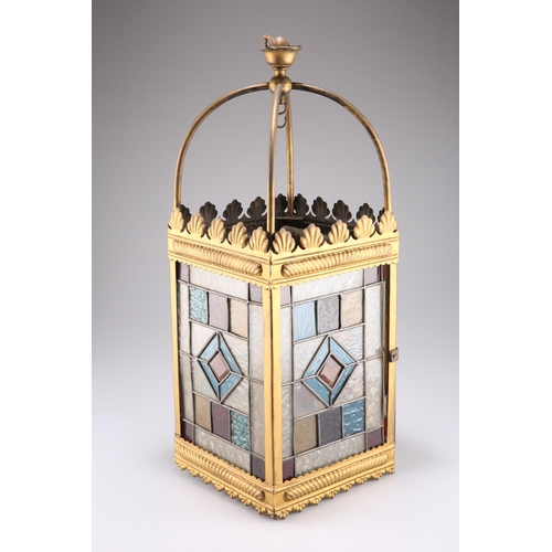 525 - A LATE VICTORIAN BRASS, LEADED AND STAINED GLASS LANTERN, of square-section, the glass arranged to f... 