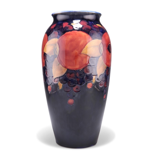 53 - A MOORCROFT LARGE POTTERY VASE, baluster form, 'Pomegranate' pattern, tubelined and hand-painted in ... 