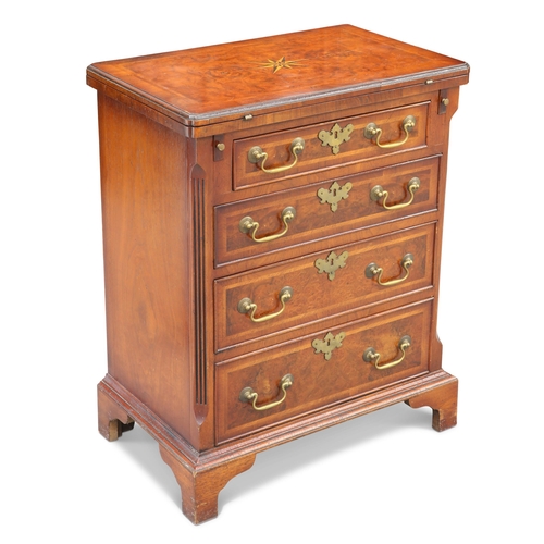 551 - A GEORGIAN STYLE BURR ELM AND INLAID BACHELORS CHEST, the hinged rectangular top with inverted corn... 