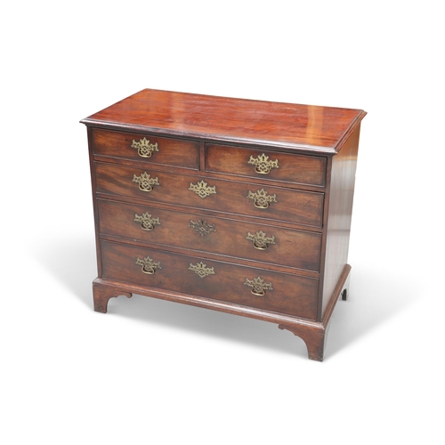 577 - A GEORGE III MAHOGANY CHEST OF DRAWERS, the rectangular top above two short over three long graduate... 